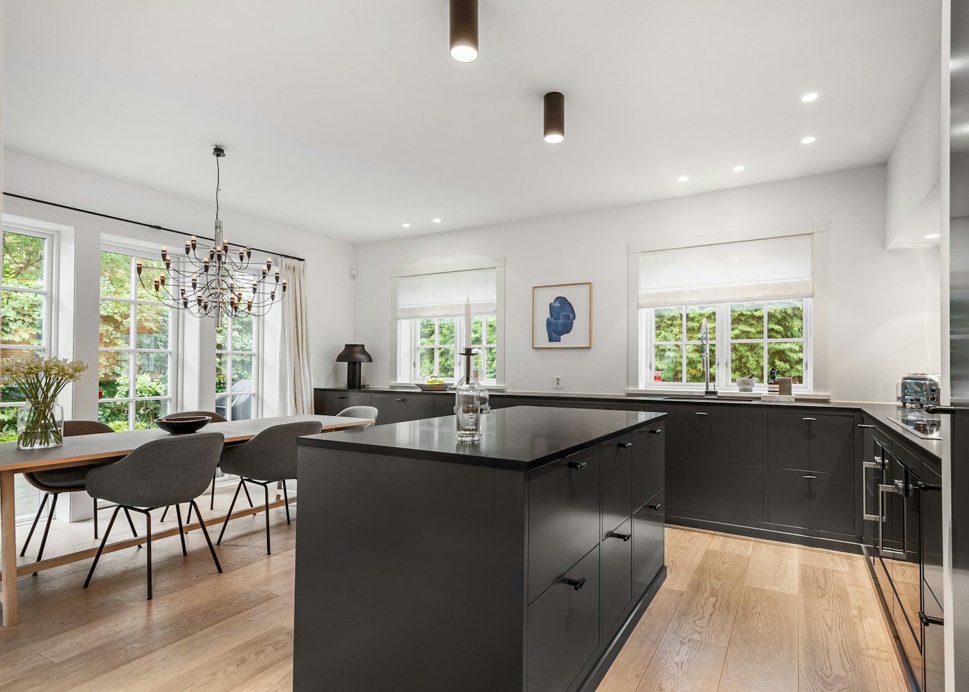 Photographed kitchen with finished flooring around an island